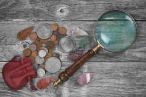 monedas lente
