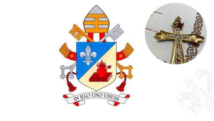 escudo y cruz